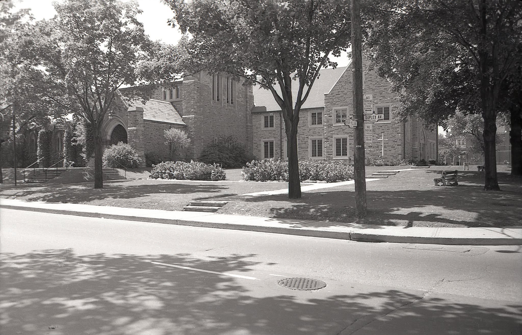 Briar Hill and Duplex Avenue, the Anglican Church of St. Clement, 1960s.Some trees are gone, some new ones have grown, the benches have moved, the path has changed, but otherwise much the same today.