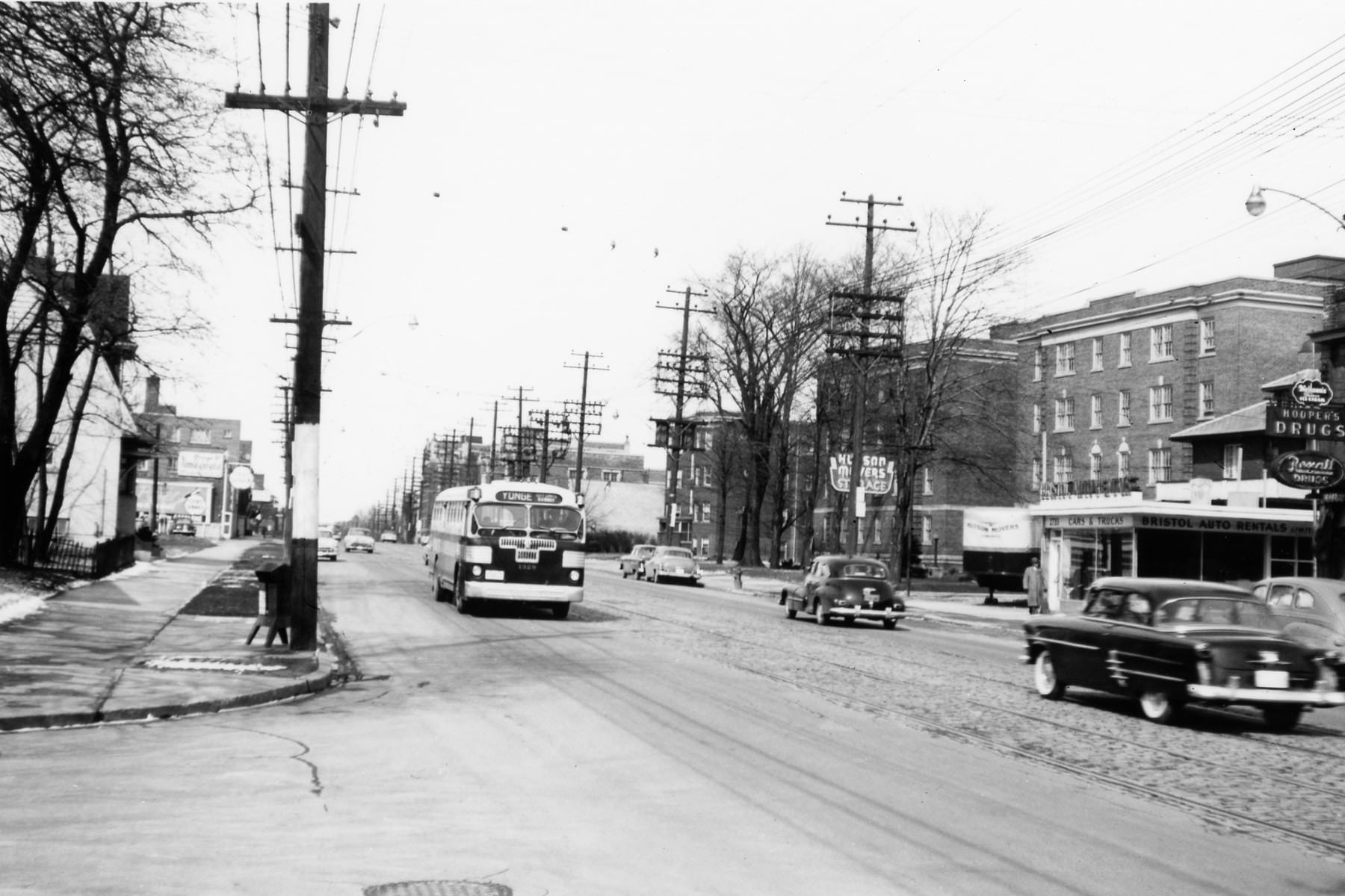 Bus on Yonge Street near Alexandria Street, 1954.