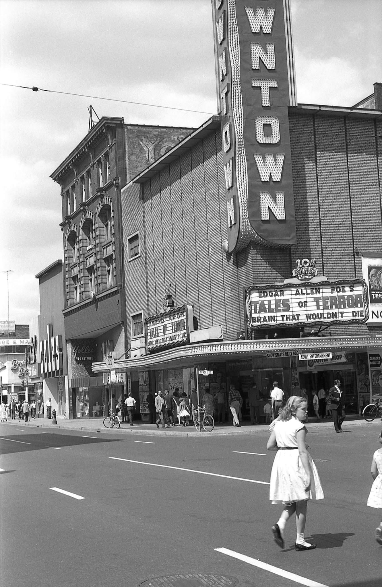 Looking northeast on Yonge St. to the 1,059-seat Downtown Theatre, 1962.