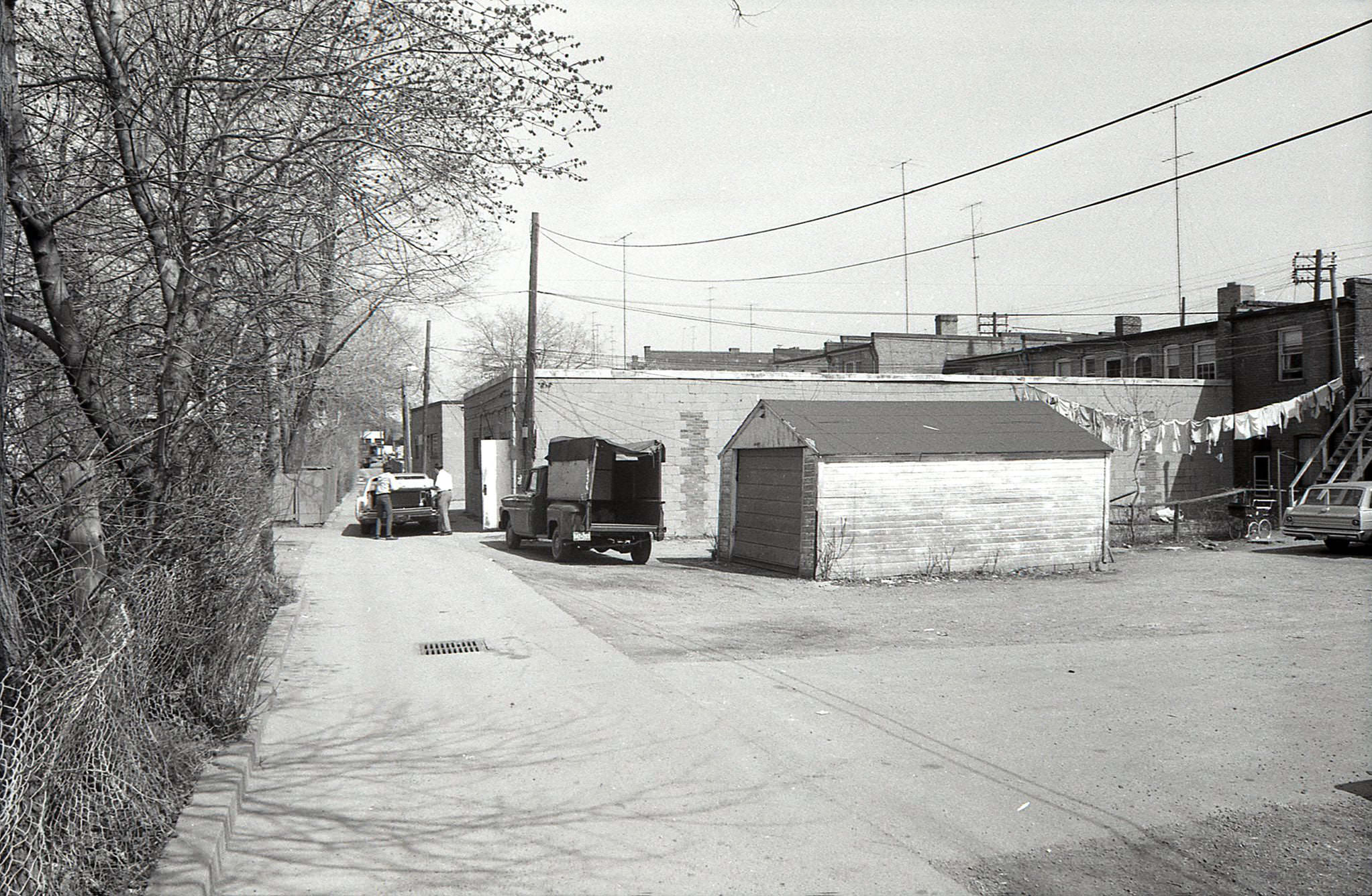 Loading the trunk in the laneway behind 3368 Yonge Street, 1969.