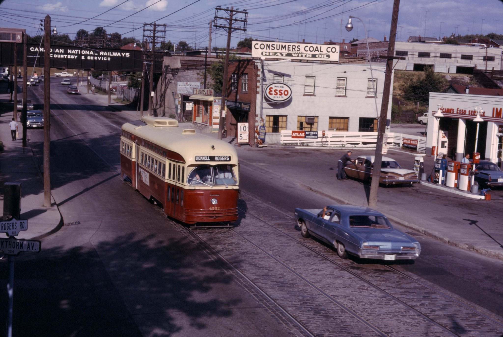 The same location as it looked in a later slide that I purchased from John Bromley. TTC Streetcar 4552 WB on Rogers at Blackthorn - 7th July 1966