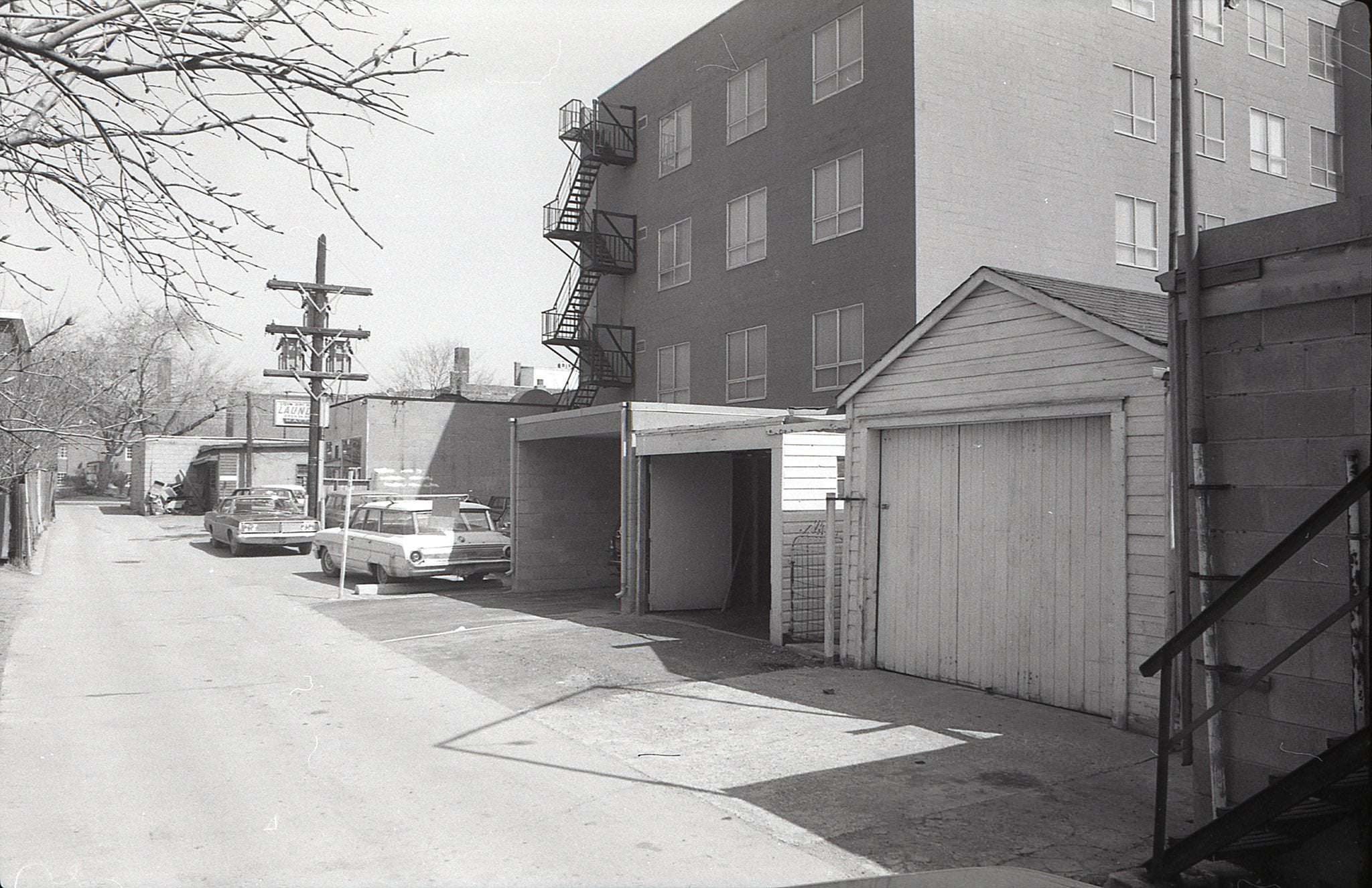 Looking north from Brookdale Ave., the laneway behind the west side of Yonge, April 1969. The rear of 3284 Yonge Street in the middle of the frame.