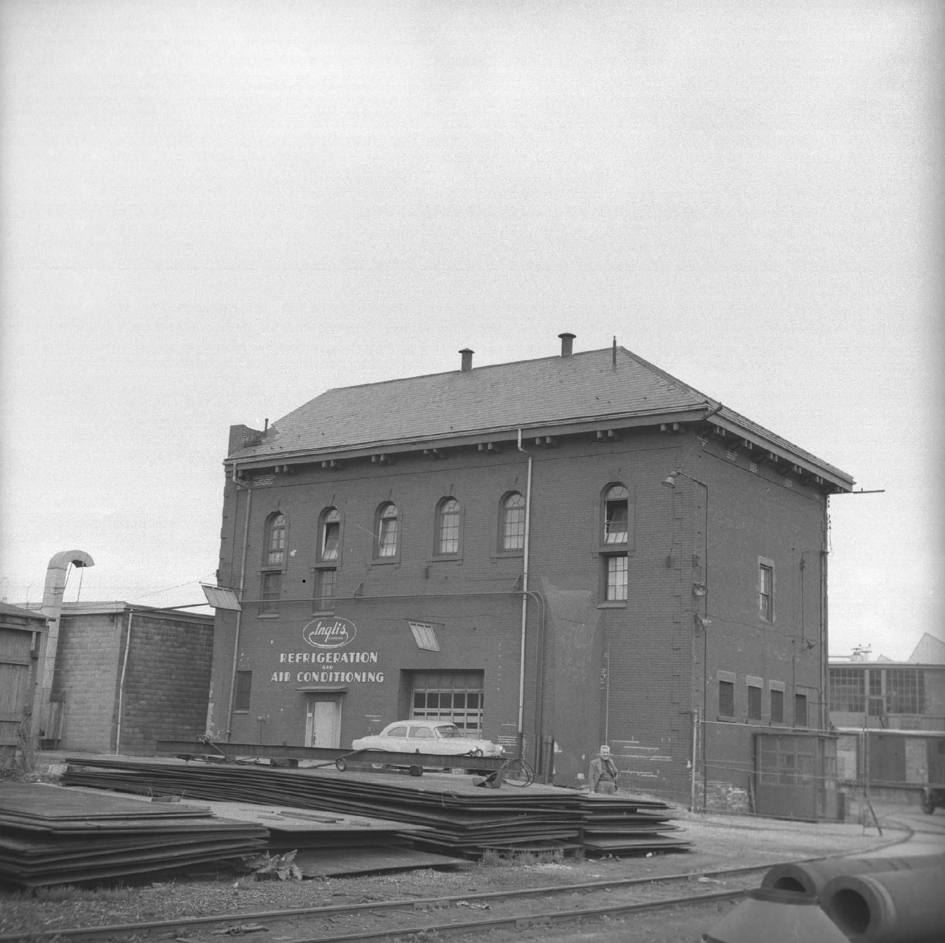Portion of the former Central Prison in use by John Inglis & Co., Strachan Avenue, west side, south of King St. Photo by James V. Salmon, May 1953.