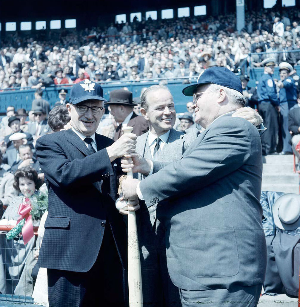 Jack Kent Cooke (centre) with Mayor Nathan Phillips (right) and Metro Chairman Frederick G. Gardiner (left), Maple Leaf Stadium, 1955