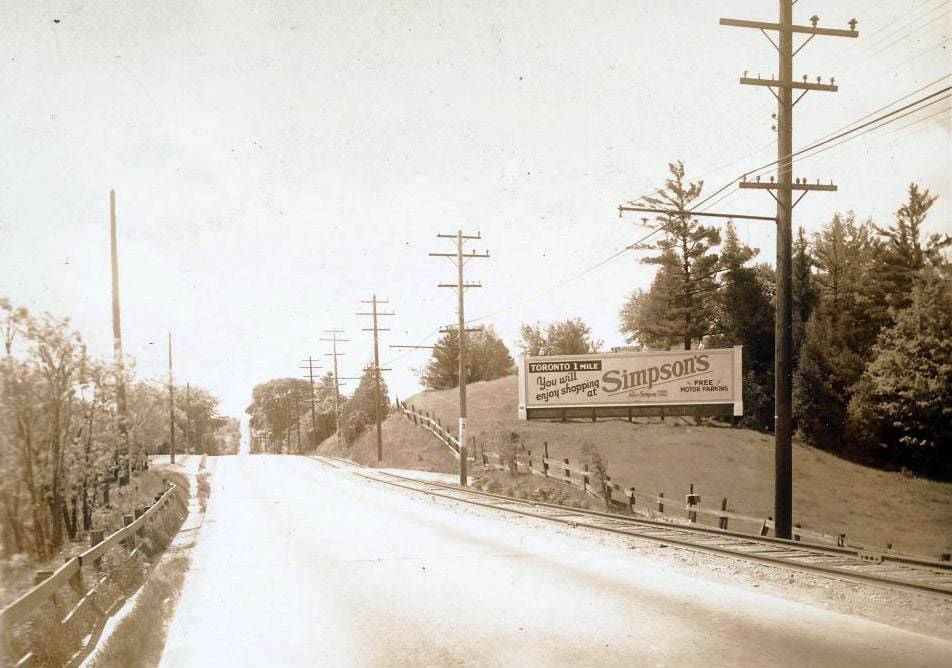 Stop 3 is listed as Sweeney's Side Road. This view is looking south on Yonge St. from approximately the south side of the 401 down into Hogg's Hollow, 1920s