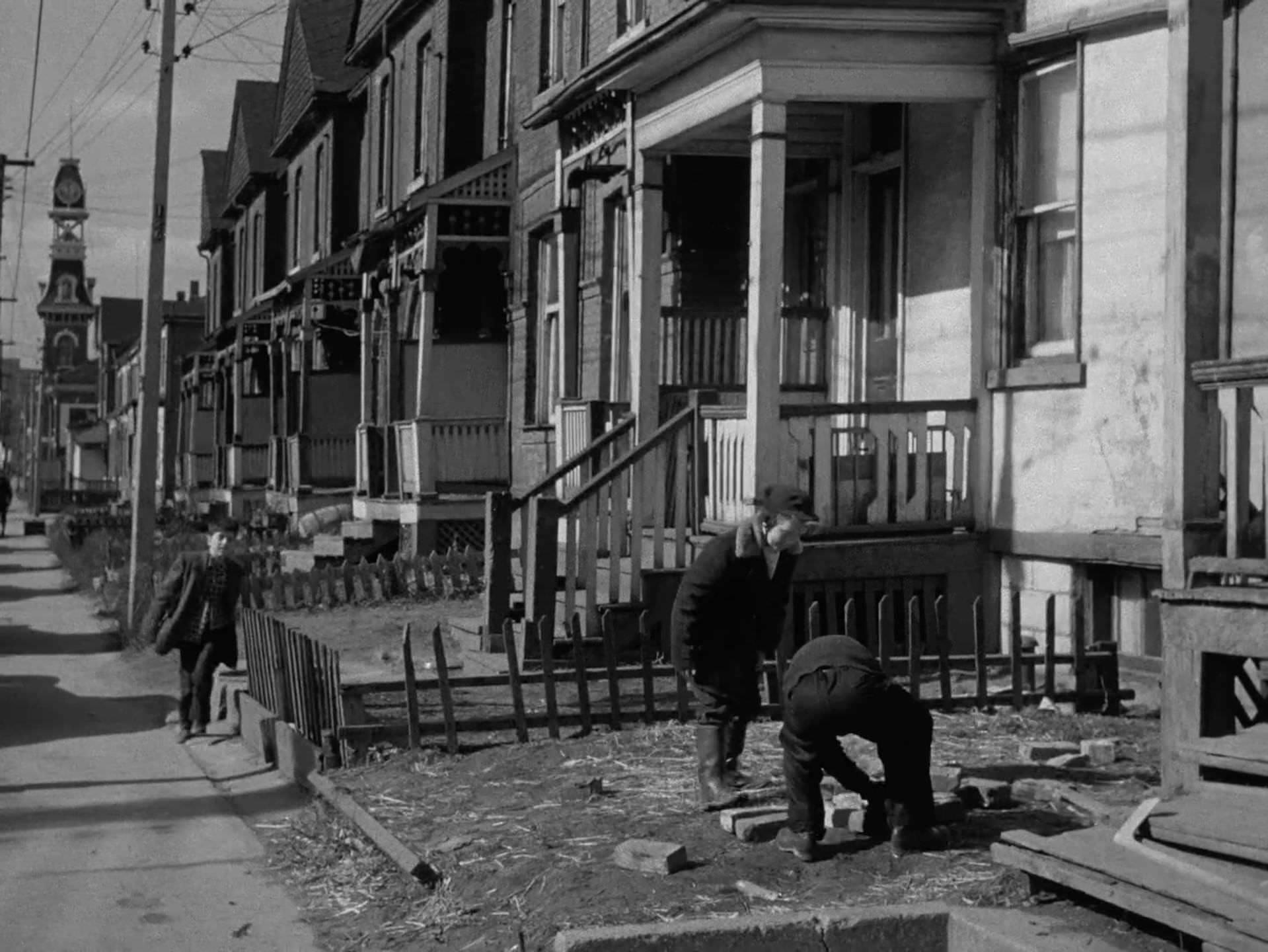 North side of Dundas St. E., looking west to TFD Fire Station 7 at Parliament St. - A still from 'Farewell Oak Street', 1953