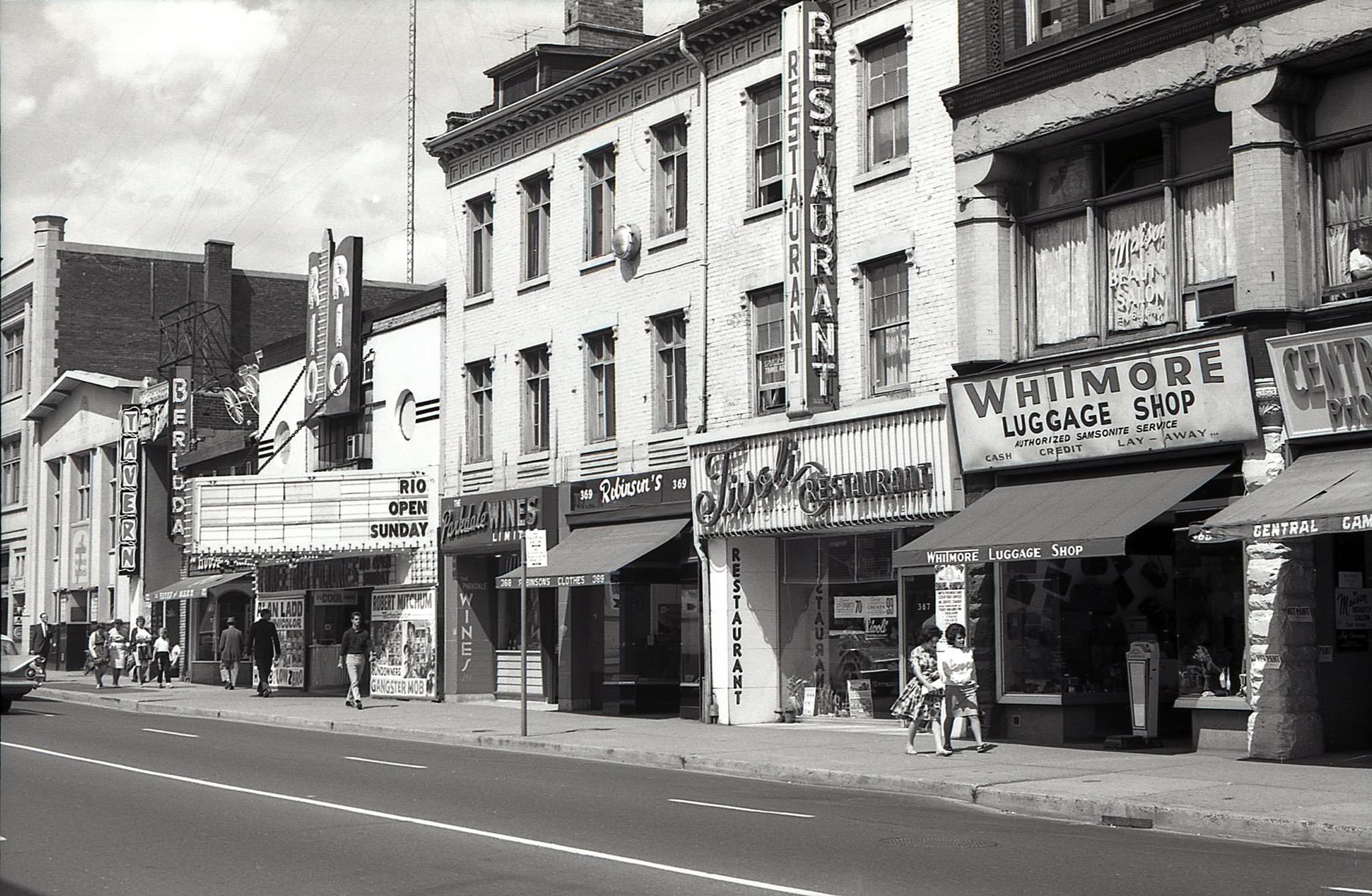 Apart from the facade of the Yonge Street Mission, this stretch of streetscape no longer exists. East side of Yonge St. just south of Gerrard St., 1962.