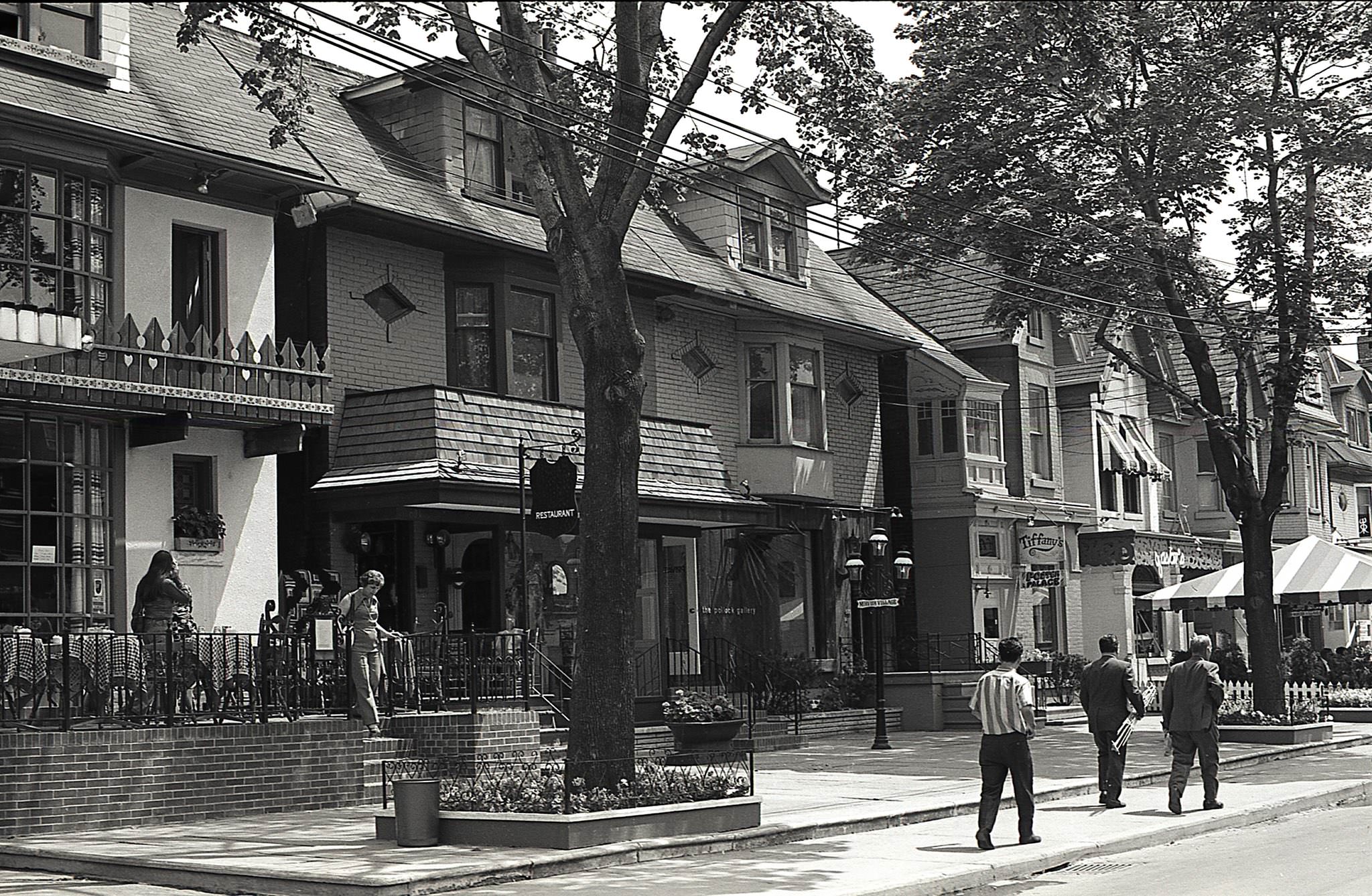 Mirvish Village, around 1970. Looking south along the east side of Markham Street. Gaston’s French Restaurant, Tiffany’s, Poster Palace, and the Pollock Gallery.
