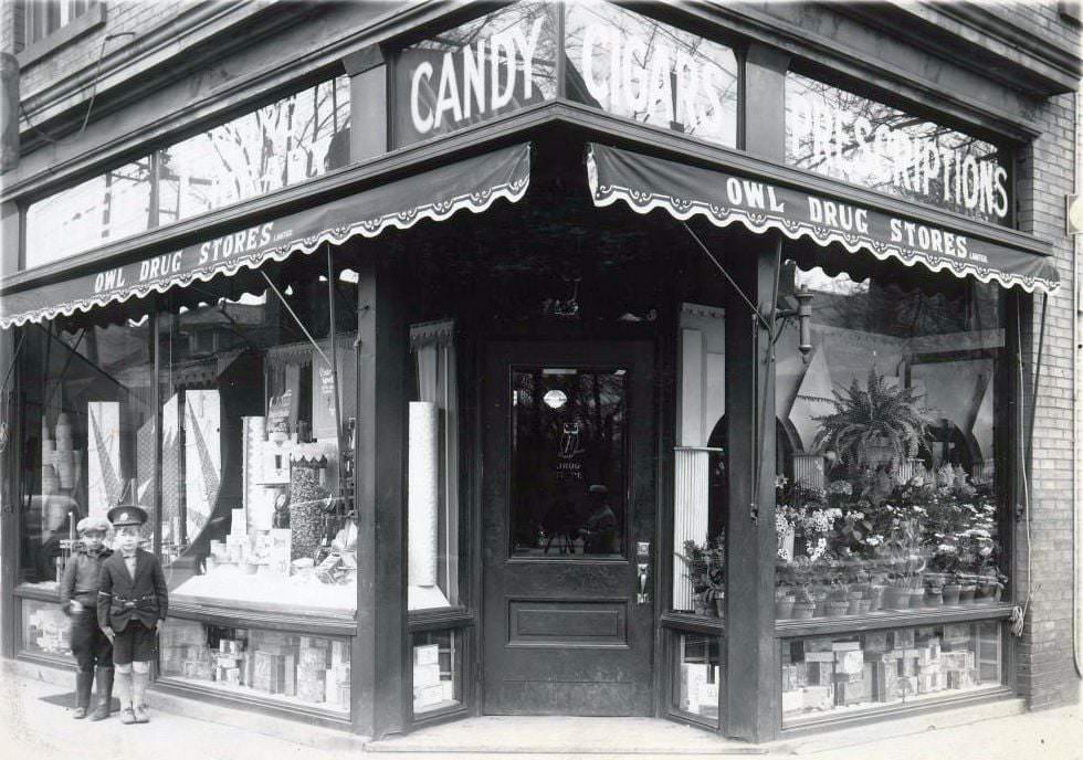 Owl Drug Stores Limited. A signage on a storefront located at the north-west corner of Bloor Street West and Spadina Road, 1929