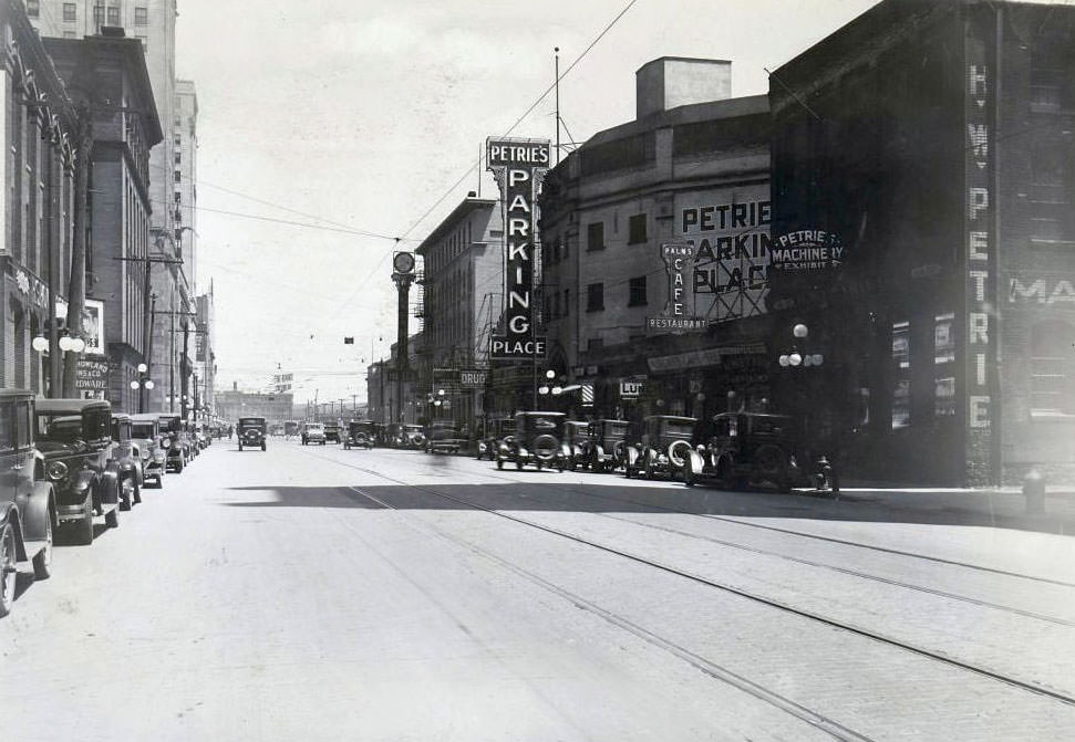 Petrie's Parking Place - Electric overhanging sign on a building located on the south side of Front Street West, west of York Street, 1929