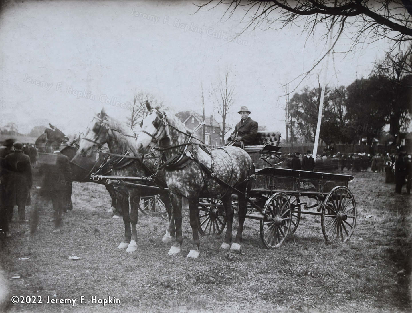 M.A. Ramsay of Downsview, Ontario with his horse team & wagon at what appears to be a large event in the 1900s.