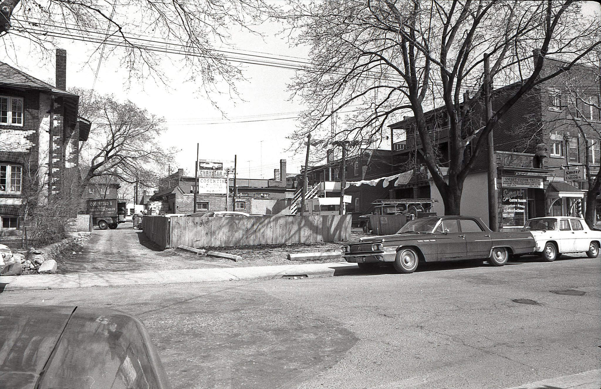 Melrose Avenue, just west of Yonge, looking north along the lane behind the main street shops, 1969