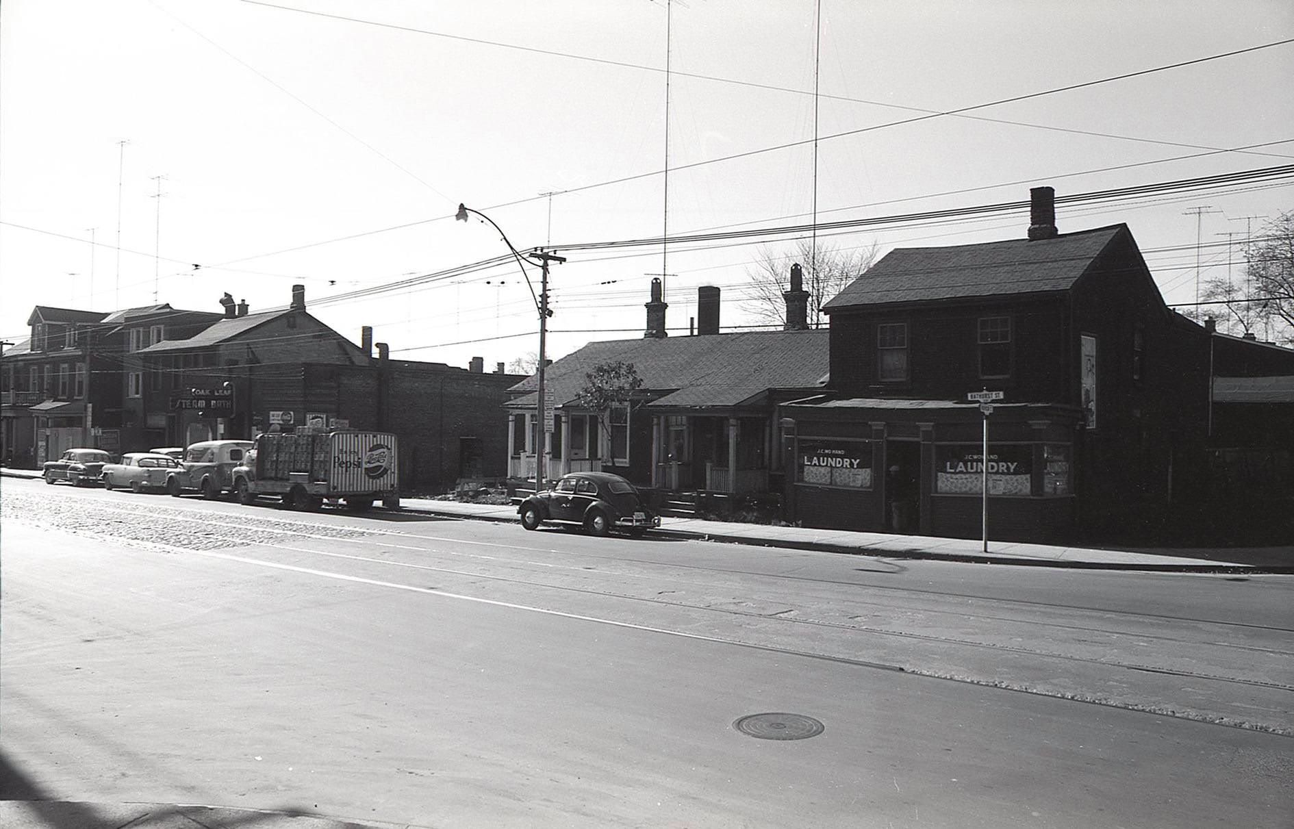 Another view of the Oak Leaf Steam Baths, looking southwest from Bathurst and Robinson. The old Pepsi truck is a neat detail." 216 Bathurst Street, late 1950s.