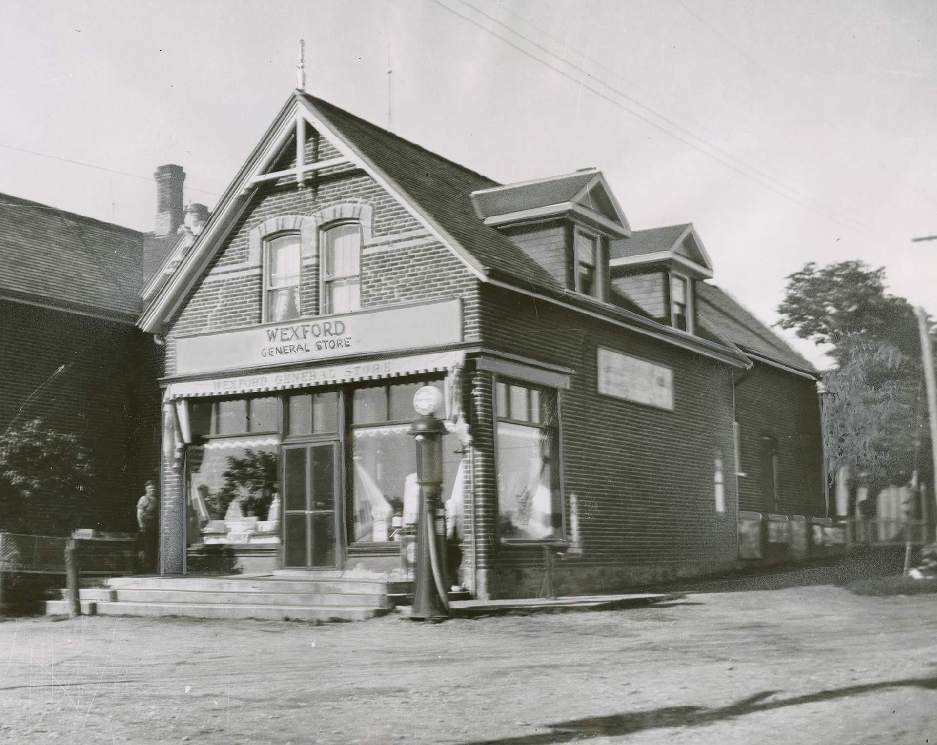 Wexford landmark razed. One of the last links with Wexford village's past, an 1883-vintage store at the southwest corner of Lawrence and Pharmacy Aves. in Scarboro township is being torn down to widen Lawrence Avenue., 1960