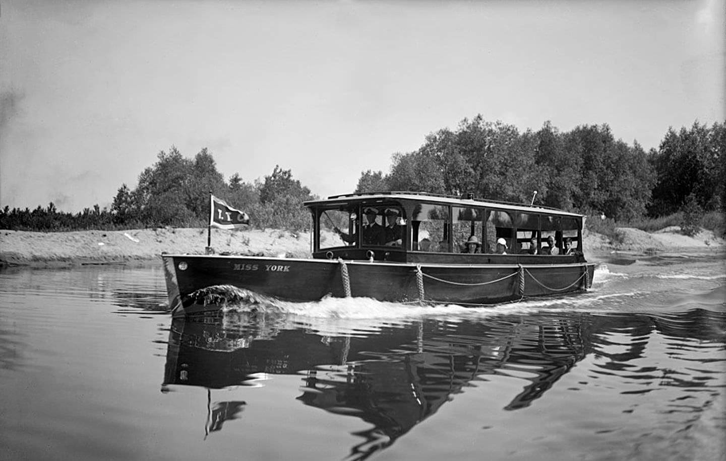 The 'Miss York' motor launch plying its way around the Toronto Islands during a tour, July 29, 1929.