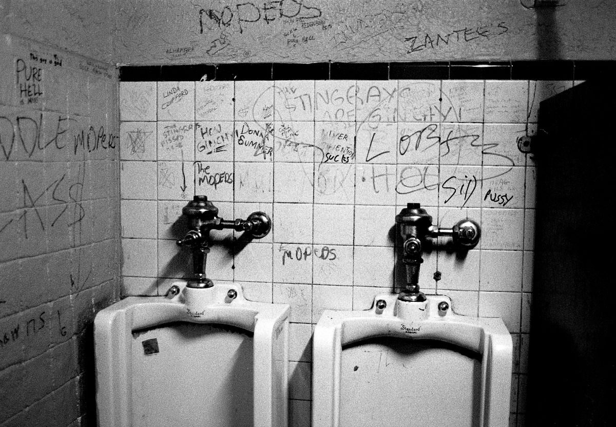 Messages in a toilet of a punk bar