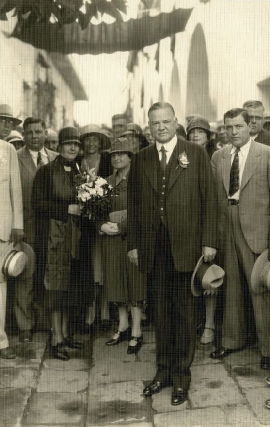 President Hoover–Mrs. Hoover holding bouquet