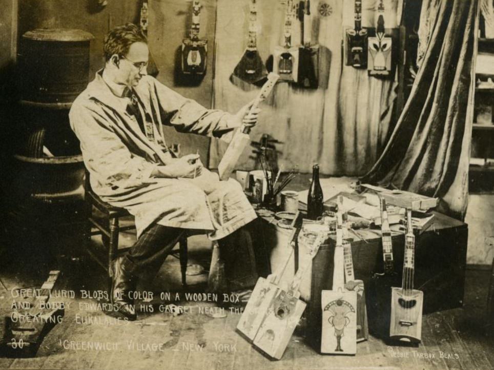 Great lurid blobs of color on a wooden box and Bobby Edwards in his garret ‘neath the stars creating ukeleles