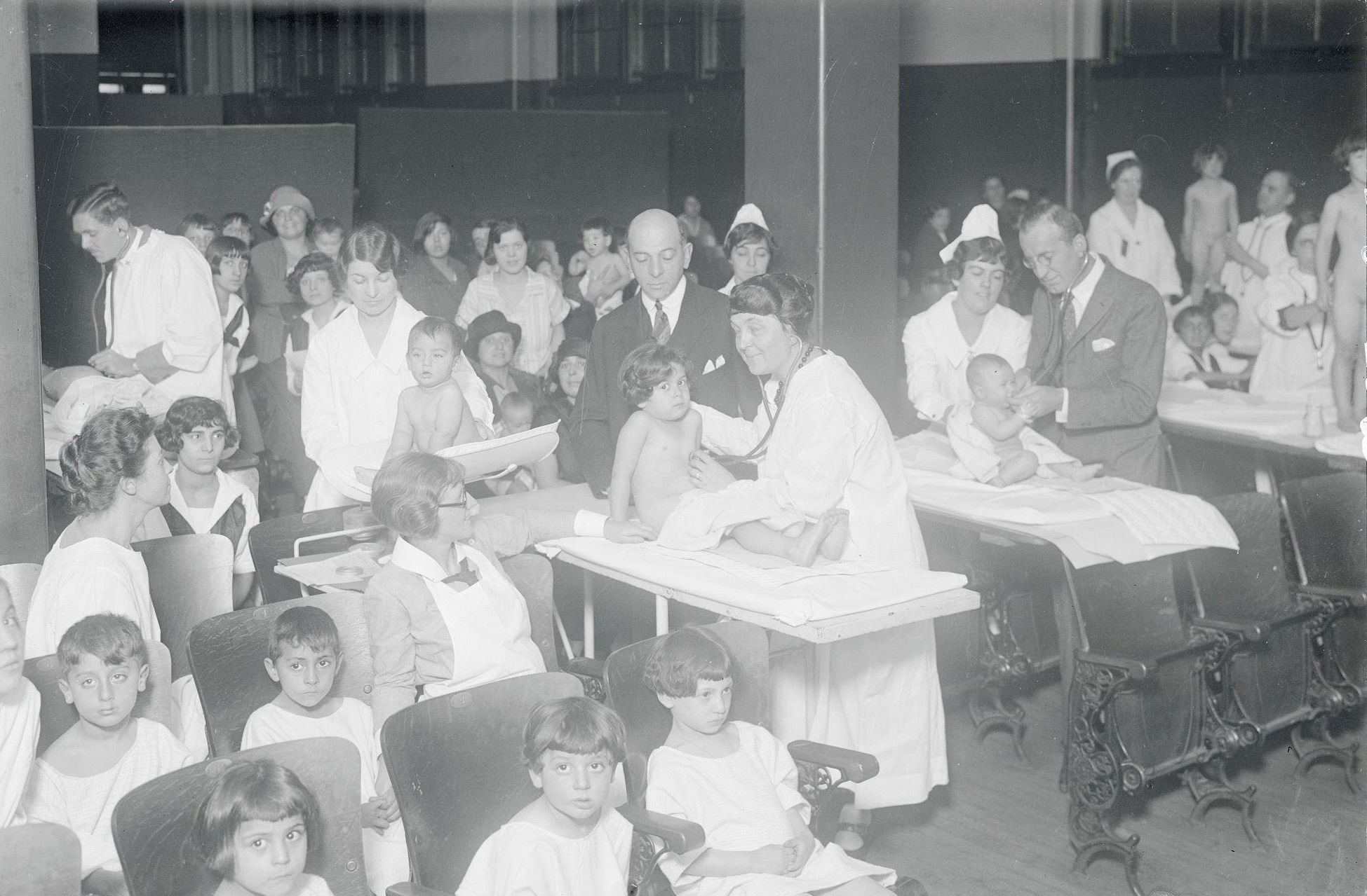 A scene in the public school 38 auditorium during the annual Greenwich Village baby contest in which hundreds of childrenware entered.