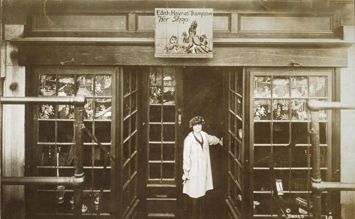 Edith Hayes Thompson standing in the doorway of Her Shop, 1920