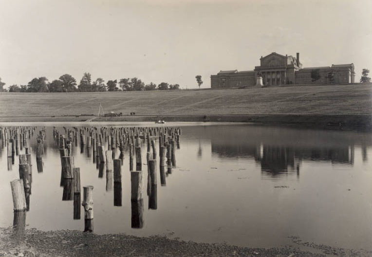 Wooden piers placed in the Grand Basin, Forest Park, for construction of the stage for the Pageant and Masque of St. Louis, 1914