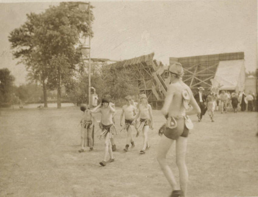 Boys who perform as Maya youths coming off the stage of the Masque, 1914