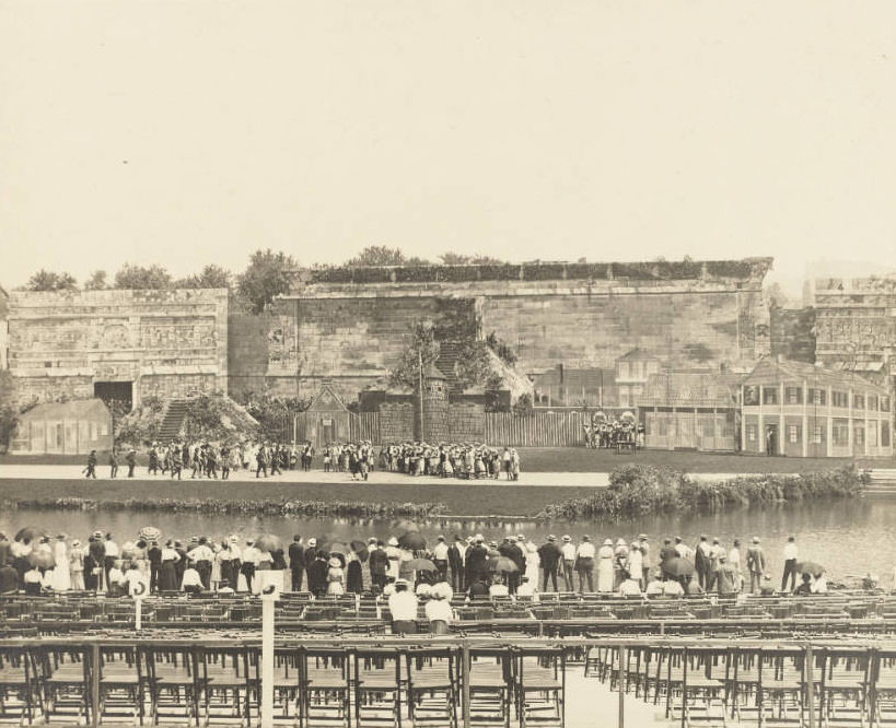 Looking towards the stage in Forest Park, St. Louis, Missouri, the audience watch volunteer actors portraying Spanish turning the Louisiana Territory to the French in St. Louis in a reenactment of Three Flags Day