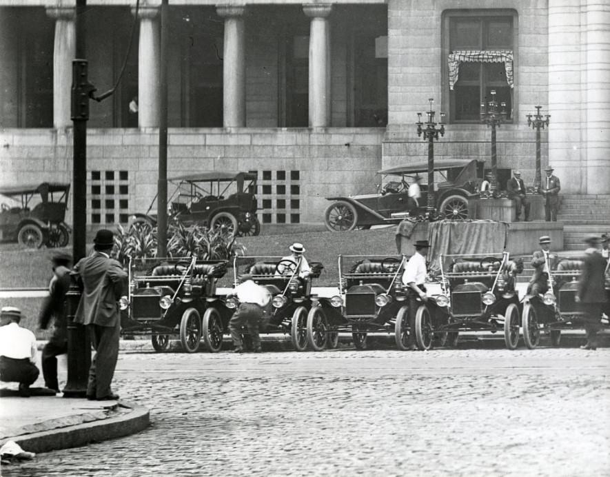 The City's new fleet of Fords, on exhibition at City Hall, 12th street side.