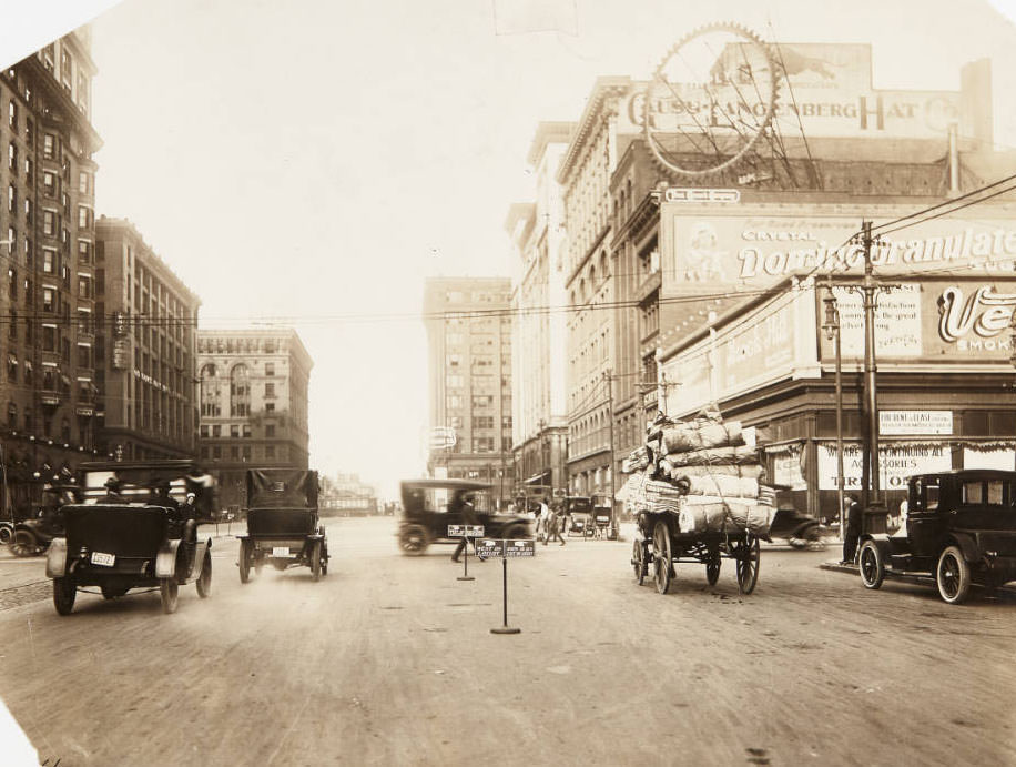 A busy street scene at the intersection of 12th and Locust, looking north, 1910