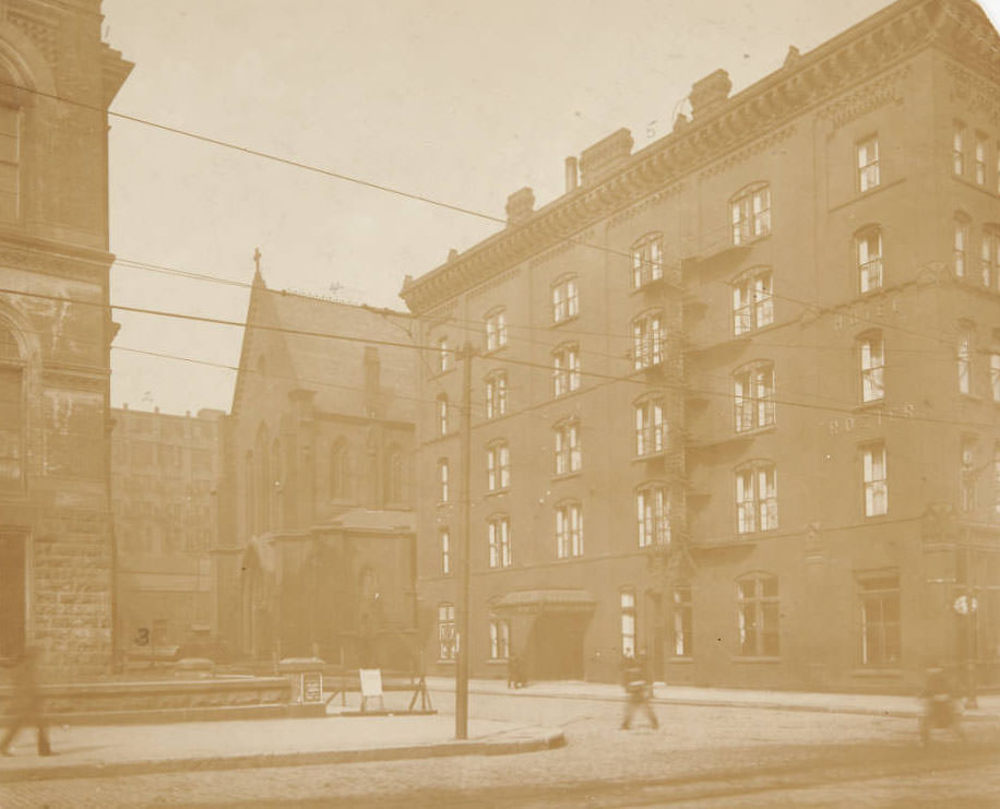 Buildings near the corner of 13th and Olive Streets, future site of Central Library, 1910