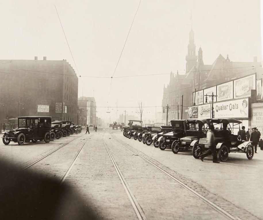 A row of automobiles parked along 12th Street, looking south, 1913