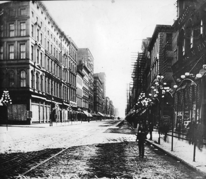 Broadway looking south from Washington. The illumination bug bit St. Louis in 1882 when 140 plumbers scurried to set up gas pipes for lamplit arches along 44 blocks of the business section.