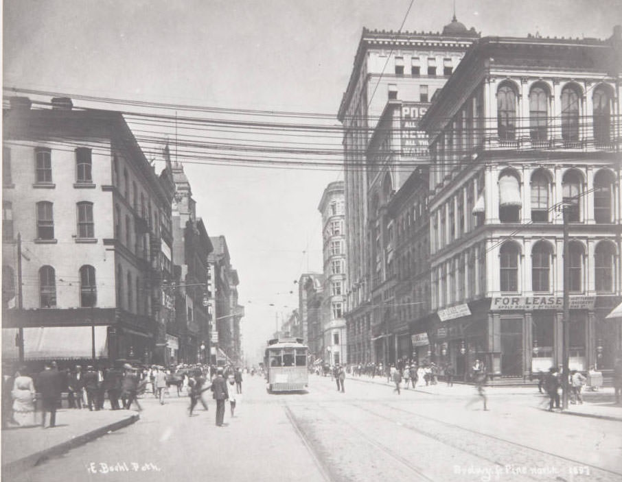 A streetcar and numerous pedestrians on Broadway looking north from its intersection with Pine Street, 1897