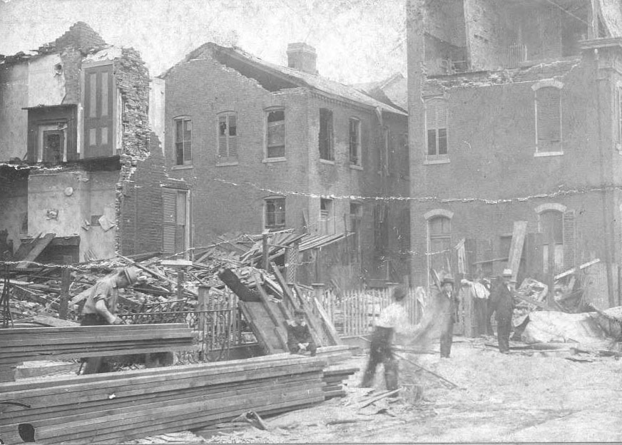 Cleanup is underway in this view of 8th and Rutger streets, in the Soulard neighborhood. The tornado did some of its worst damage, with much loss of life, in this area.