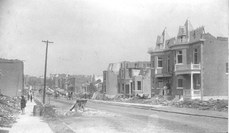 This view of Allen Avenue, looking west from Jefferson Avenue, clearly shows the severe damage inflicted on the homes and other buildings along this street, just southwest of Lafayette Park.