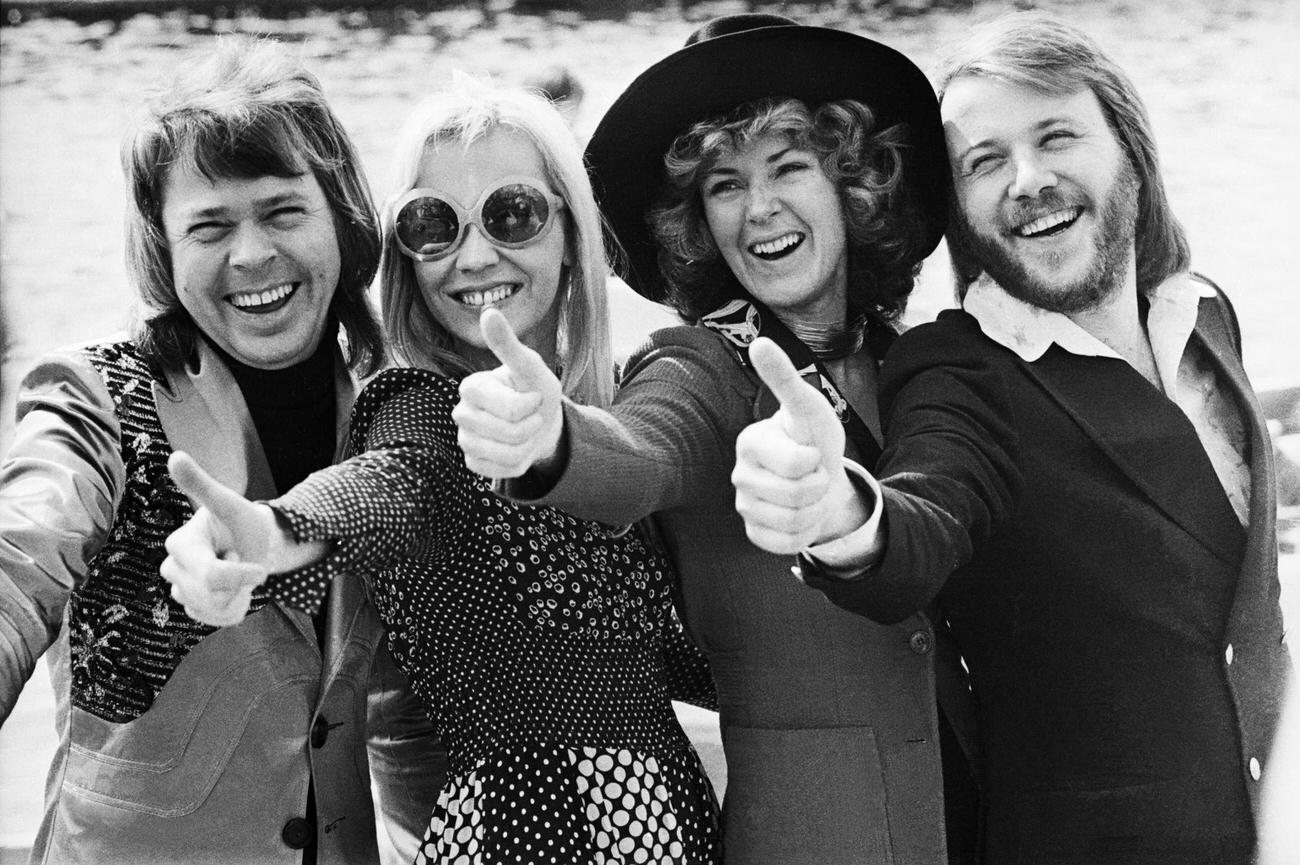 ABBA give the thumbs up after winning the Eurovision Song Contest with their song 'Waterloo', Brighton, 7th April 1974.