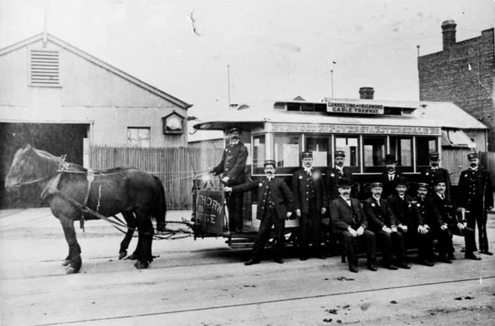 Melbourne Tramway and Omnibus Company horse tram and workers at Auburn and Riversdale Road depot, 1910.
