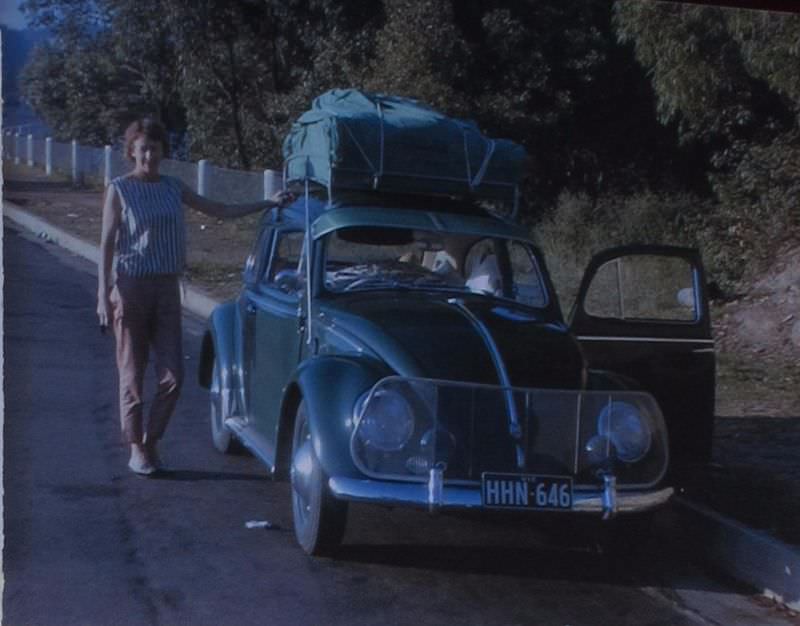 Betty beside VW, 1963
