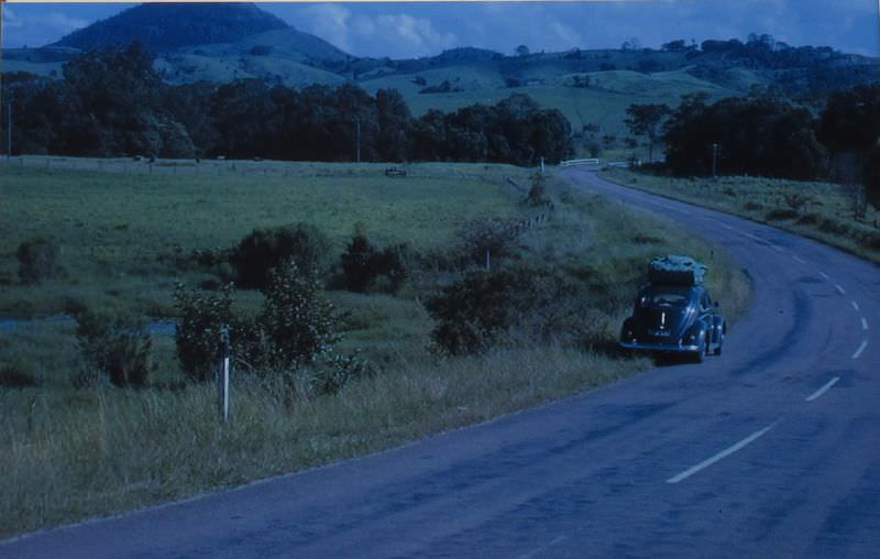 VW at highway, 1963