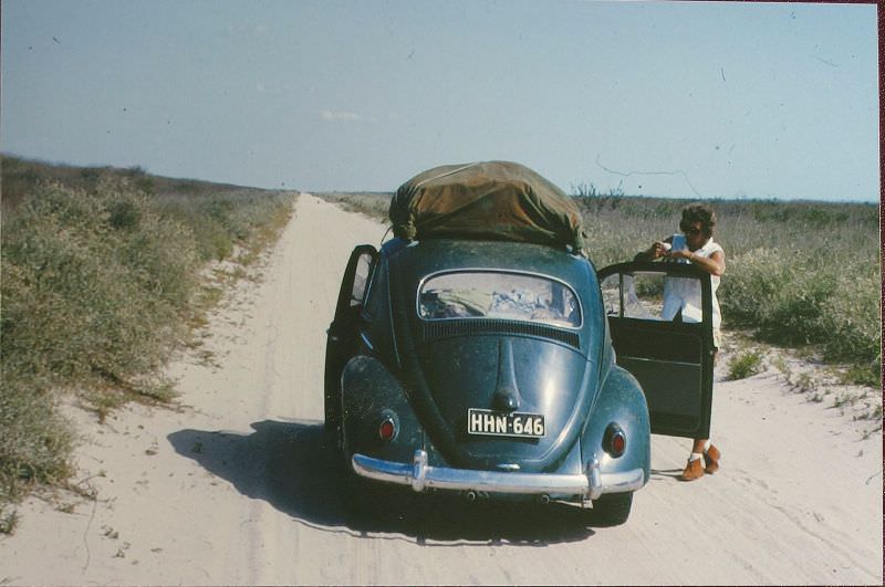 VW rear with Betty somewhere remote, 1963