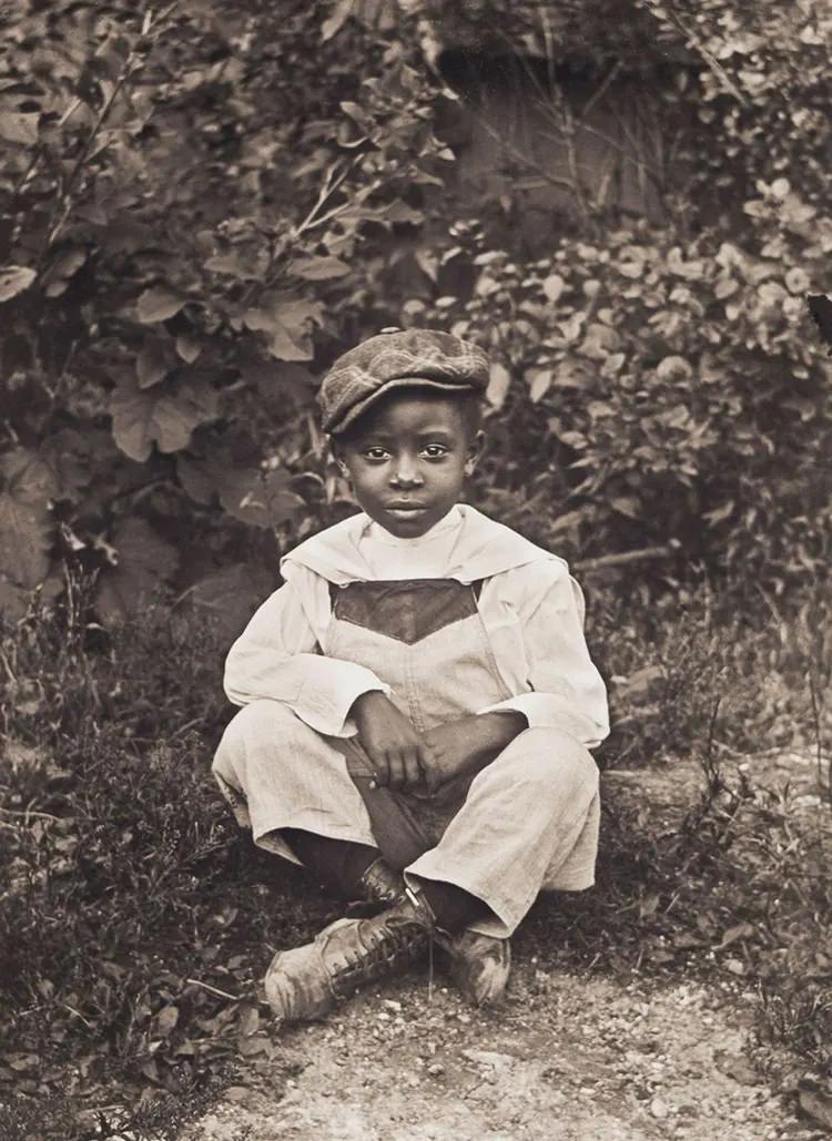 Boy Sitting on Grass, 1904.