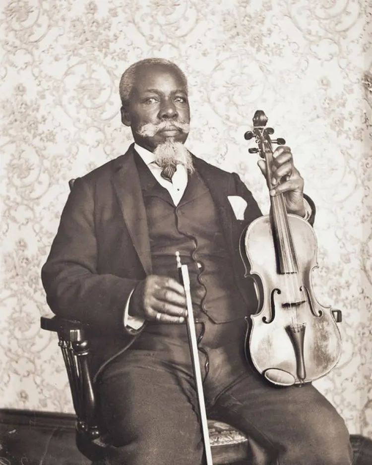 David T. Oswell with His Viola. David Oswell, born in Boston, emigrated from St. John’s, New Brunswick, Canada, to Worcester in 1877.