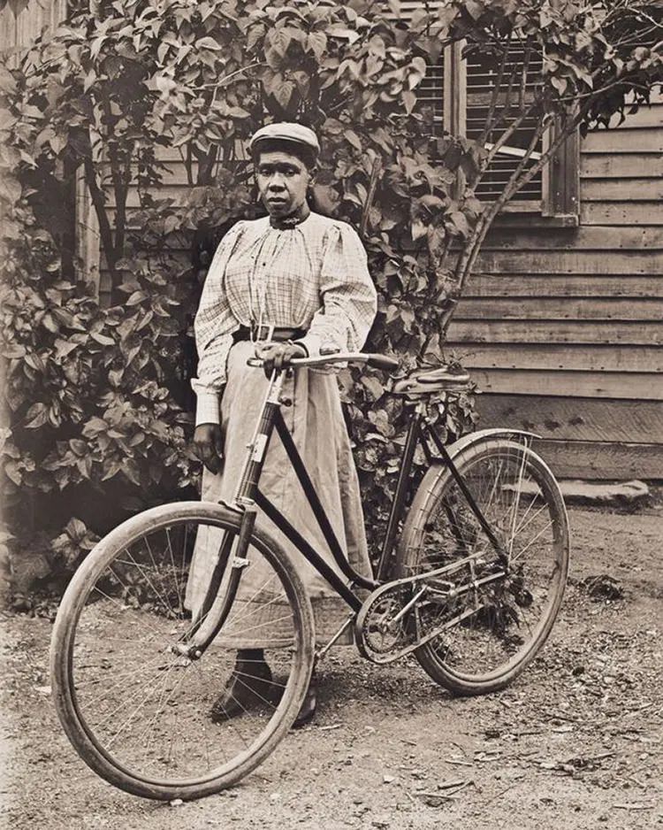 Rose Perkins Posing with Her Bicycle, 1900.