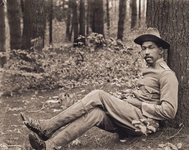 Reuben Griffin Seated against a Tree, 1901.