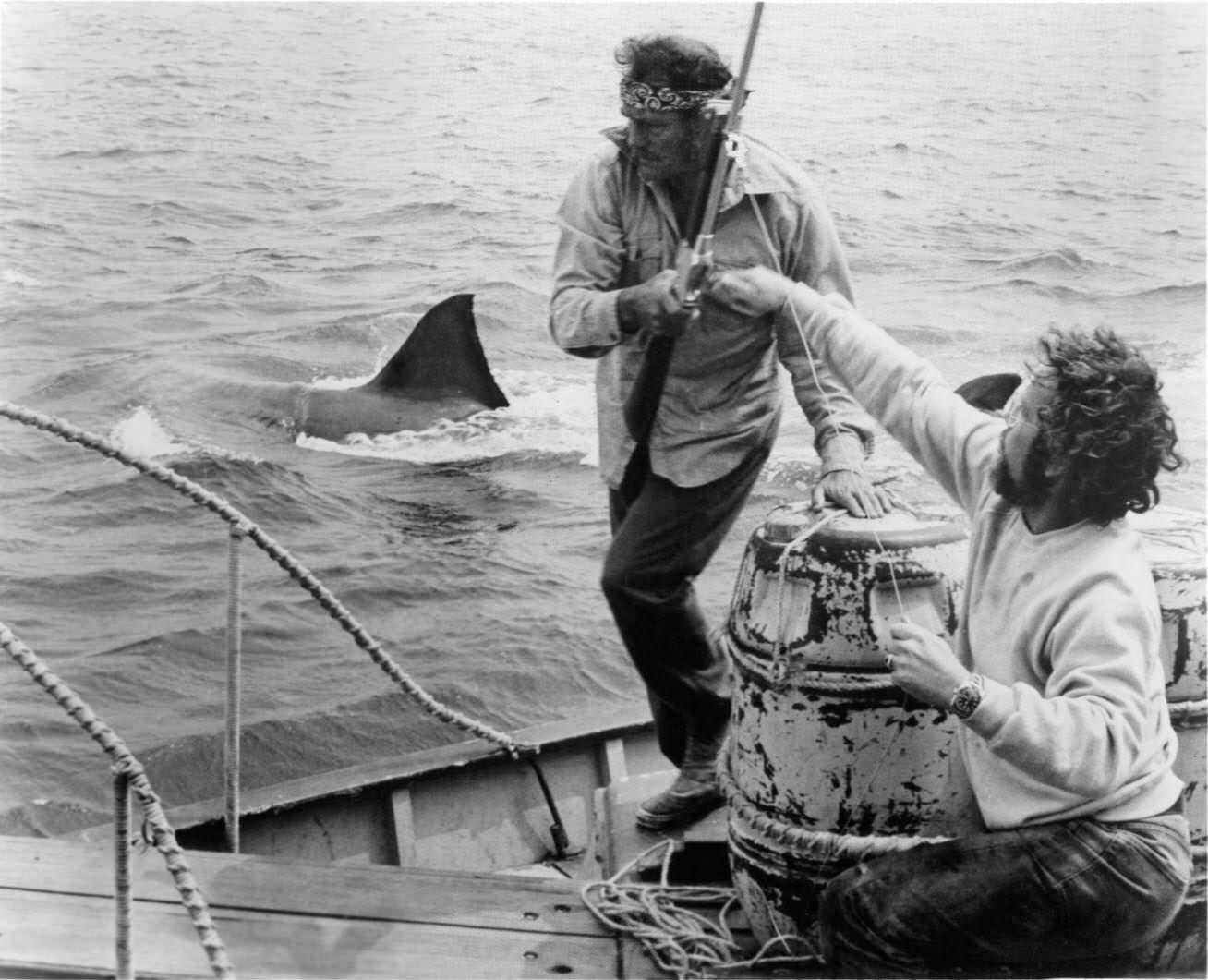 Robert Shaw and Richard Dreyfuss prepare to do battle with a mammoth man eating Great White Shark in a scene from the film 'Jaws', 1975.