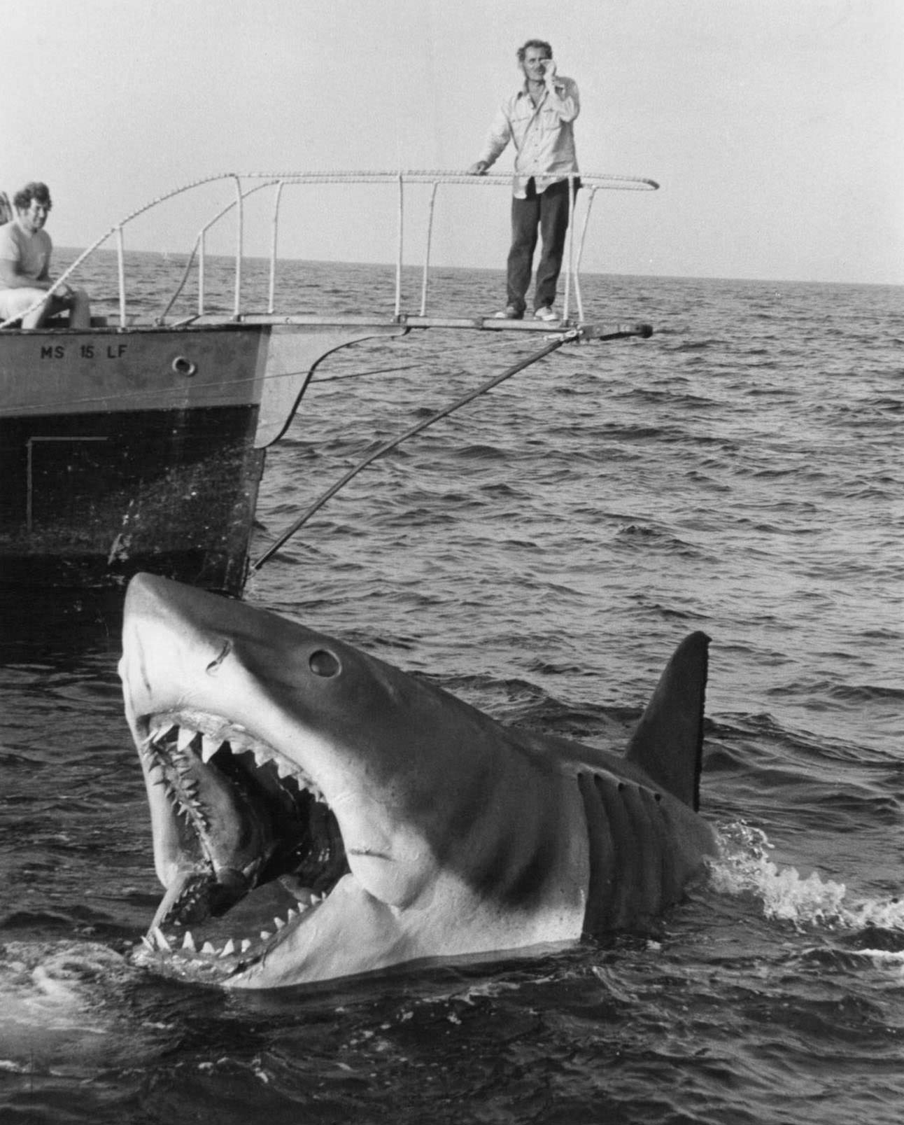 Robert Shaw stands over Jaws in a scene from the film 'Jaws', 1975.