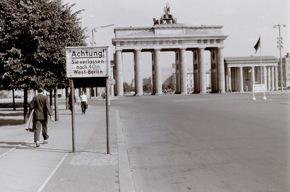 This view is looking into East Berlin from the western sector. The border lies 40 metres past the notice. Despite what was commonly thought, the whole of the Brandenburger Tor was in East Berlin.