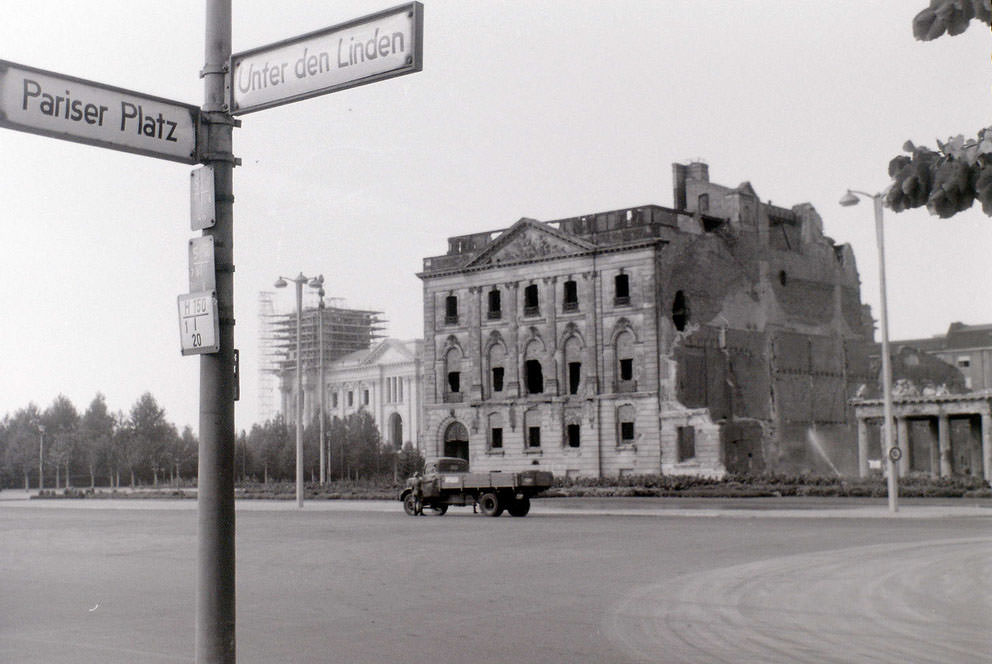 The bombed building was on the north side of Unter den Linden in East Berlin, very near the Brandenburger Tor, with the Reichstag beyond it being in West Berlin.