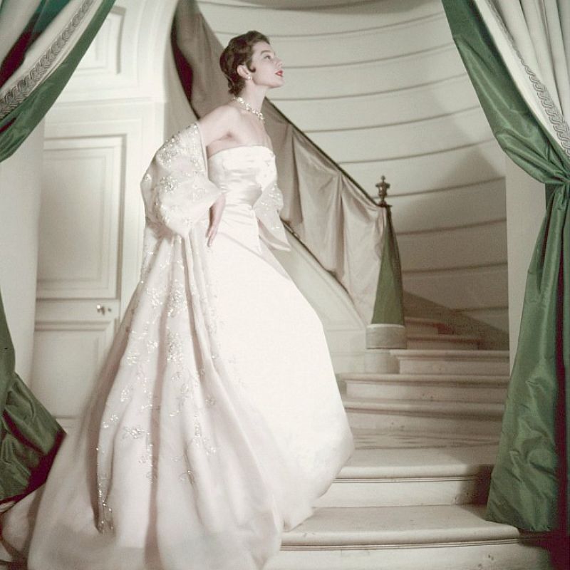 Bettina wearing a pink strapless gown and embellished organdy coat from Dior, Paris, May 1953
