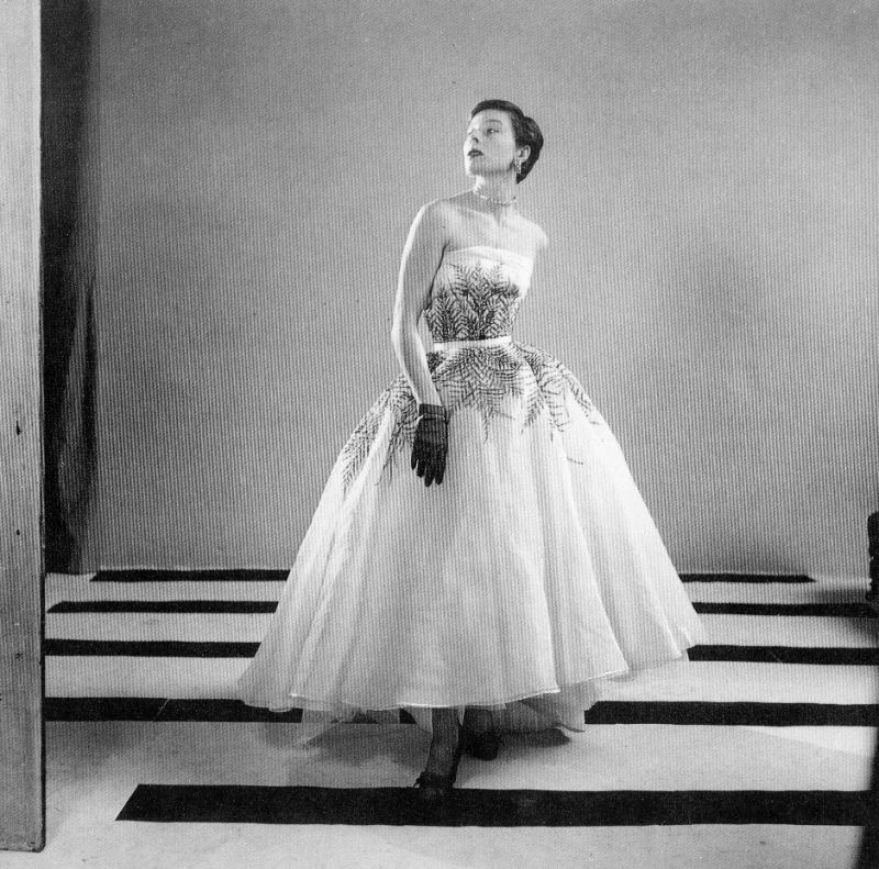 Bettina in Fath's organdy evening dress with fern embroidery by Lesage, 1950